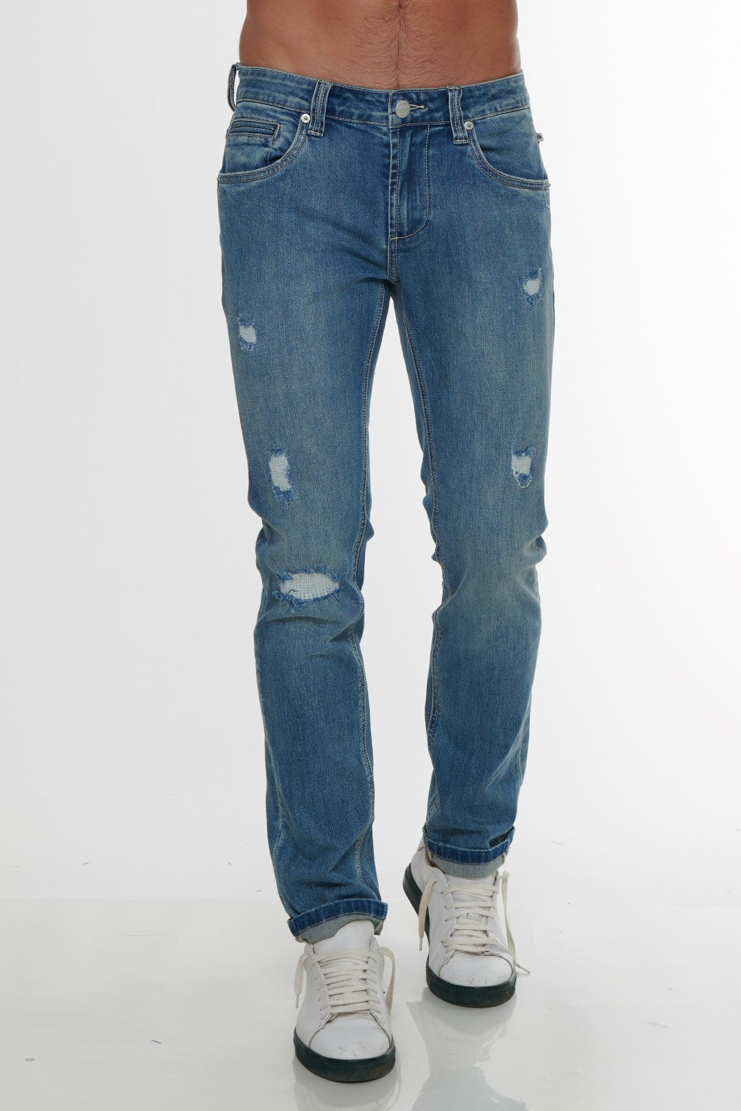 Jeans con rotture